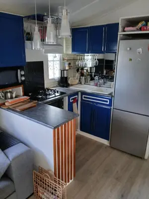 Cuisine ou kitchenette dans l'établissement Julieregis