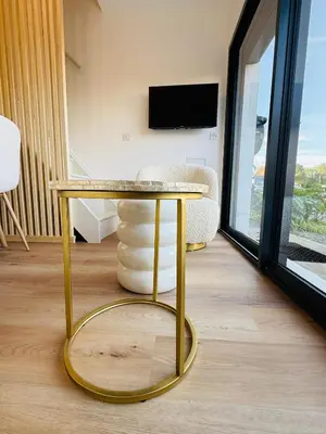 Télévision ou salle de divertissement dans l'établissement Studio Spa Du Bassin