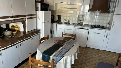 Cuisine ou kitchenette dans l'établissement Le Tuc de Rose