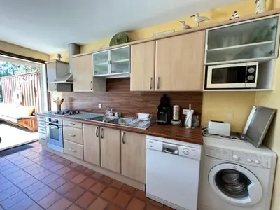Cuisine ou kitchenette dans l'établissement Pignada Maison 6p vue sur les Pins mimizan plage