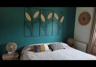 Un ou plusieurs lits dans un hébergement de l'établissement Appartement cosy de Marie Lou