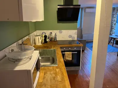 Cuisine ou kitchenette dans l'établissement Le Cocon Authentique