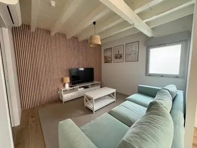 Télévision ou salle de divertissement dans l'établissement La Maison du Caz