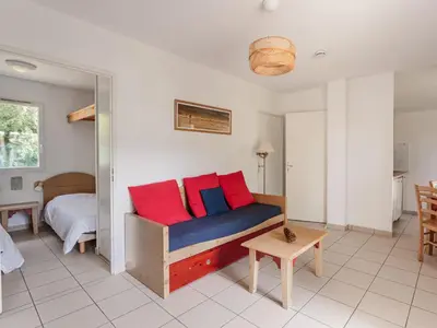 Coin salon dans l'établissement Allee des Dunes N27 3P6