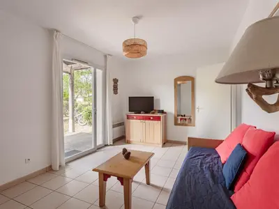 Télévision ou salle de divertissement dans l'établissement Allee des Dunes N27 3P6