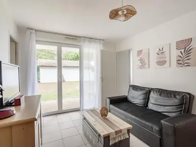 Coin salon dans l'établissement Allee des Dunes N37 4P7