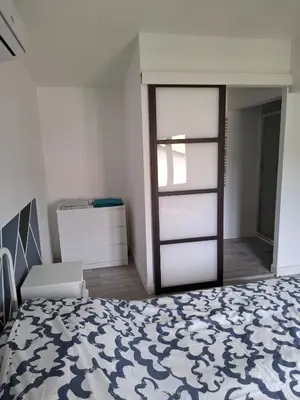Un ou plusieurs lits dans un hébergement de l'établissement Maison et appartement 7 chambres, piscine