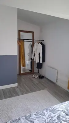 Un ou plusieurs lits dans un hébergement de l'établissement Ateka 2 appartements 4 chambres