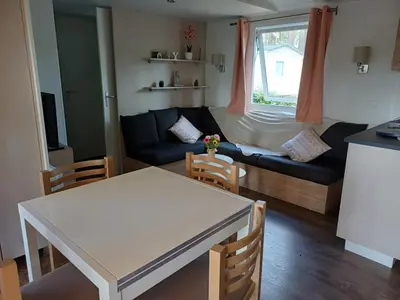 Coin salon dans l'établissement MH 6 à 8 personnes - Camping les Dunes de Contis