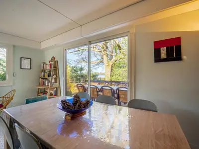 Coin salon dans l'établissement Maison familiale au bord du lac d'Aureilhan pour 10 personnes - FR-1-50-197