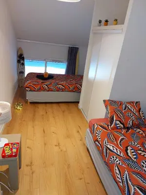 Un ou plusieurs lits dans un hébergement de l'établissement Plage 50M piscine parking spa Duplex cosy 6 pers