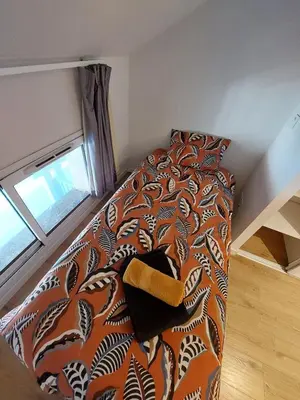 Coin salon dans l'établissement Plage 50M piscine parking spa Duplex cosy 6 pers
