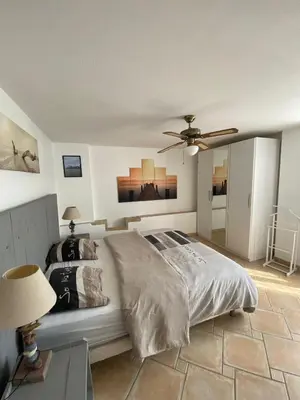 Un ou plusieurs lits dans un hébergement de l'établissement Maison à la campagne avec Piscine et Jacuzzi
