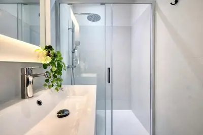 Salle de bains dans l'établissement La Villa Blanche Appart hôtel