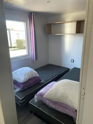 Un ou plusieurs lits dans un hébergement de l'établissement La Plage 4 étoiles à MIMIZAN emplacement E17 3CH 1SDB 6 personnes