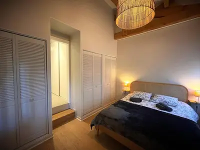 Un ou plusieurs lits dans un hébergement de l'établissement Villa spacieuse avec jacuzzi et piscine chauffée à Hossegor - FR-1-413-261