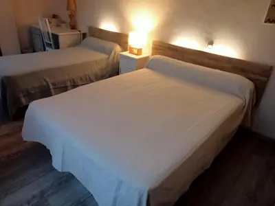 Un ou plusieurs lits dans un hébergement de l'établissement Maison de maître