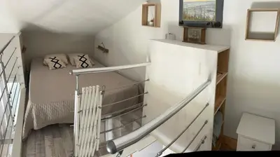 Un ou plusieurs lits dans un hébergement de l'établissement Maison côté lac