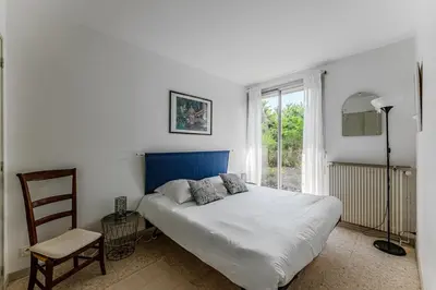 Un ou plusieurs lits dans un hébergement de l'établissement Maison au coeur des pins
