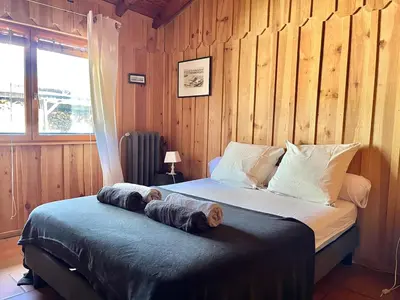 Un ou plusieurs lits dans un hébergement de l'établissement Maison atypique au coeur de notre pinede