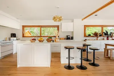 Cuisine ou kitchenette dans l'établissement Villa de la Crête - Pyla