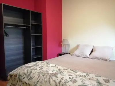 Un ou plusieurs lits dans un hébergement de l'établissement Cottage Salies