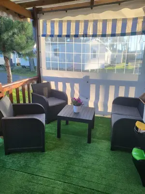 Coin salon dans l'établissement Mobilhome