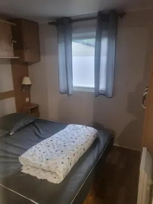 Un ou plusieurs lits dans un hébergement de l'établissement Mobilhome