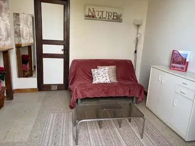 Coin salon dans l'établissement Chateau du Rau apt2