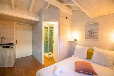 Un ou plusieurs lits dans un hébergement de l'établissement Belle Maison Ossature Bois Avec Spa Proche Océan
