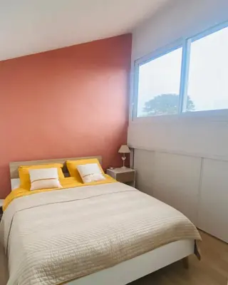 Un ou plusieurs lits dans un hébergement de l'établissement Maison cosy, calme proche du port ostréicole