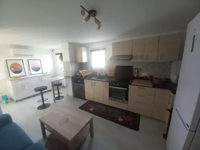 Cuisine ou kitchenette dans l'établissement MIMIZAN PLAGE SUD - LES BRUYERES- T4 59m2 climatisé