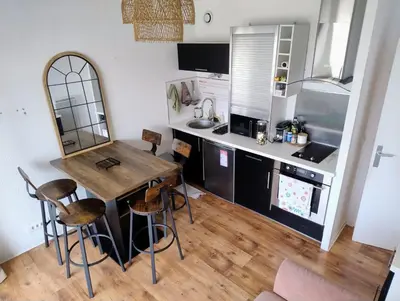 Cuisine ou kitchenette dans l'établissement Vue sur Océan