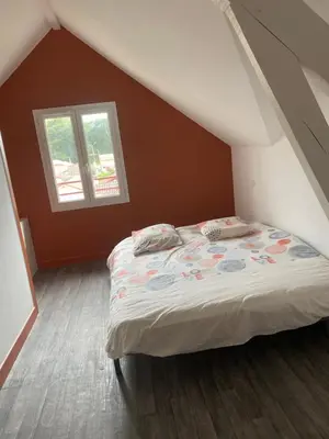 Un ou plusieurs lits dans un hébergement de l'établissement Appartement T3