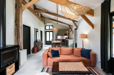 Coin salon dans l'établissement Maison et Bergerie du Chot