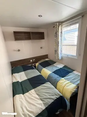 Un ou plusieurs lits dans un hébergement de l'établissement mobil home khelus