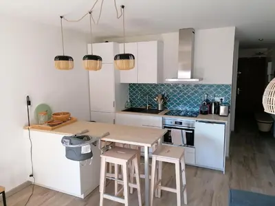 Cuisine ou kitchenette dans l'établissement Capiaa