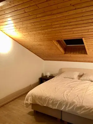 Un ou plusieurs lits dans un hébergement de l'établissement Maison familiale avec jardin, Biscarrosse lac à pied