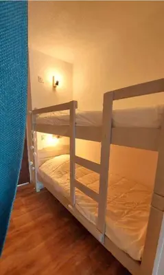 Un ou plusieurs lits dans un hébergement de l'établissement Au cœur du port de Capbreton studio confort
