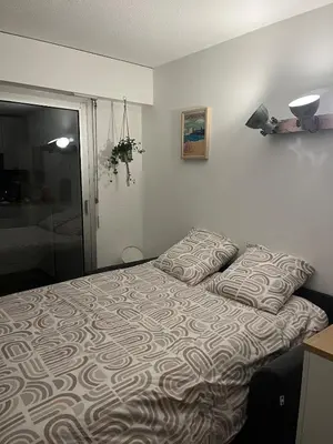 Un ou plusieurs lits dans un hébergement de l'établissement Au cœur du port de Capbreton studio confort