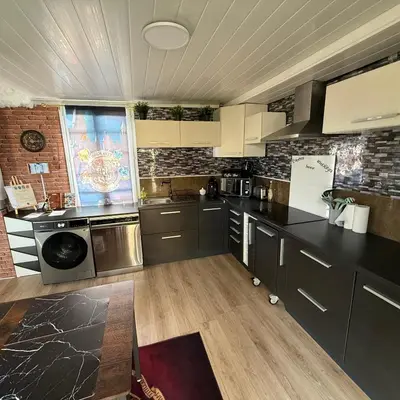 Cuisine ou kitchenette dans l'établissement La Clef d'Or