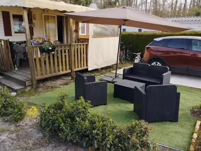 Jardin de l'établissement Mobil home climatisé confort