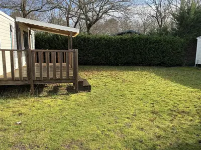 Jardin de l'établissement Mobil Home 6 à 8 personnes avec jardin