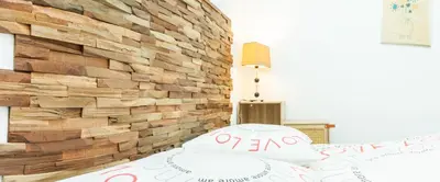 Un ou plusieurs lits dans un hébergement de l'établissement Bel appartement, résidence avec piscine