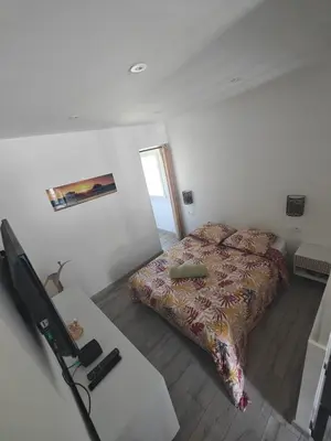 Un ou plusieurs lits dans un hébergement de l'établissement Appartement proche Dune du Pilat