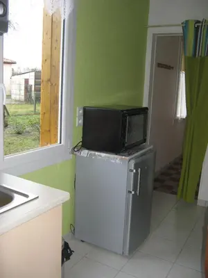 Cuisine ou kitchenette dans l'établissement La Petite Mongesse