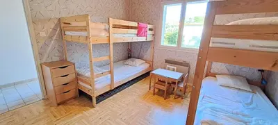 Un ou plusieurs lits dans un hébergement de l'établissement Villa Cormoran - maison principale & deux dépendances au bord de l'Océan Atlantique - Villa 7 pièces 14 personnes - (Maison principale + 2 dépendances) MAE-0893