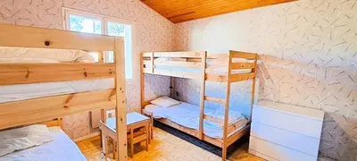 Un ou plusieurs lits dans un hébergement de l'établissement Villa Cormoran - maison principale & deux dépendances au bord de l'Océan Atlantique - Villa 7 pièces 14 personnes - (Maison principale + 2 dépendances) MAE-0893