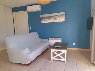 Coin salon dans l'établissement villa, climatisé domaine des grands lacs