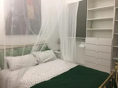 Un ou plusieurs lits dans un hébergement de l'établissement Villa piscine urt